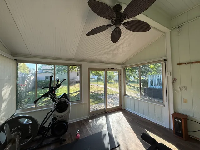 a view of a room with a large window