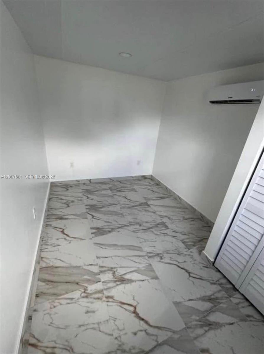 4721 Peters Road, Unit A Plantation, FL 33317 - Photo 3 of 5 a view of wooden floor