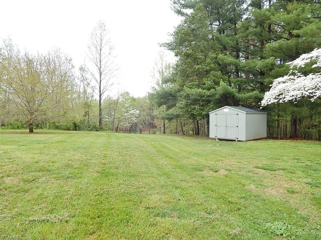501 Lemons Road Stokesdale, NC 27357 - Photo 28 of 30 Back yard