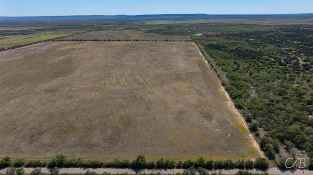 an aerial view of beach and city
