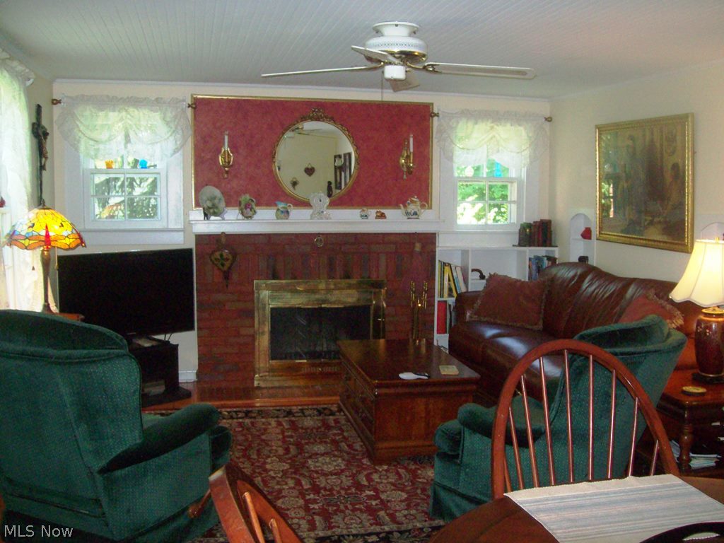 2736 Rockefeller Road Willoughby Hills, OH 44092 - Photo 12 of 22 FAMILY ROOM WITH WOOD BURNING FIREPLACE