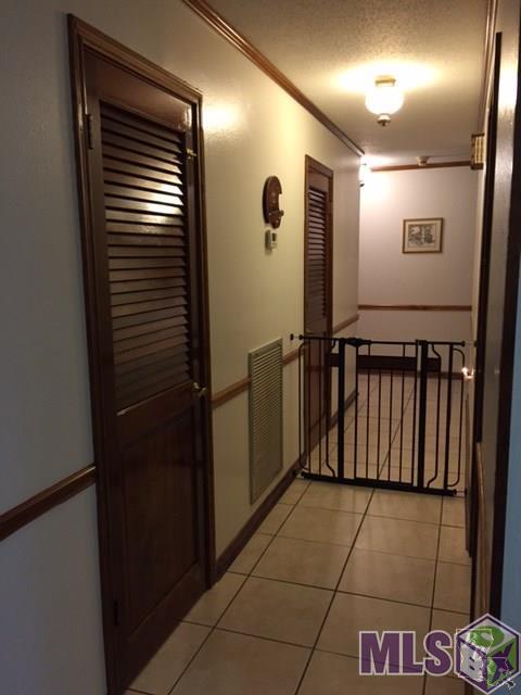 1655 Bayou Dularge Road Theriot, LA 70397 - Photo 19 of 43 hallway leading to bedrooms and bathrooms