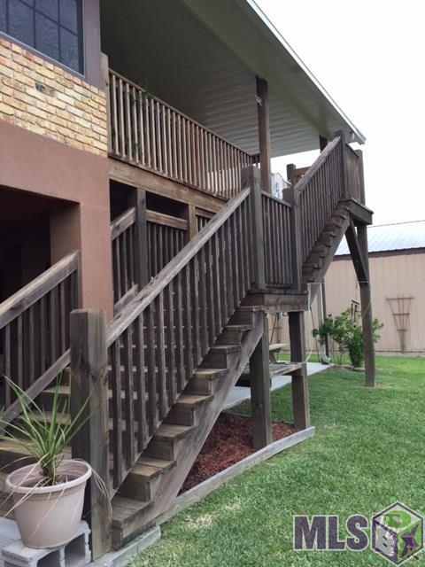 1655 Bayou Dularge Road Theriot, LA 70397 - Photo 40 of 43 stairway in back of home