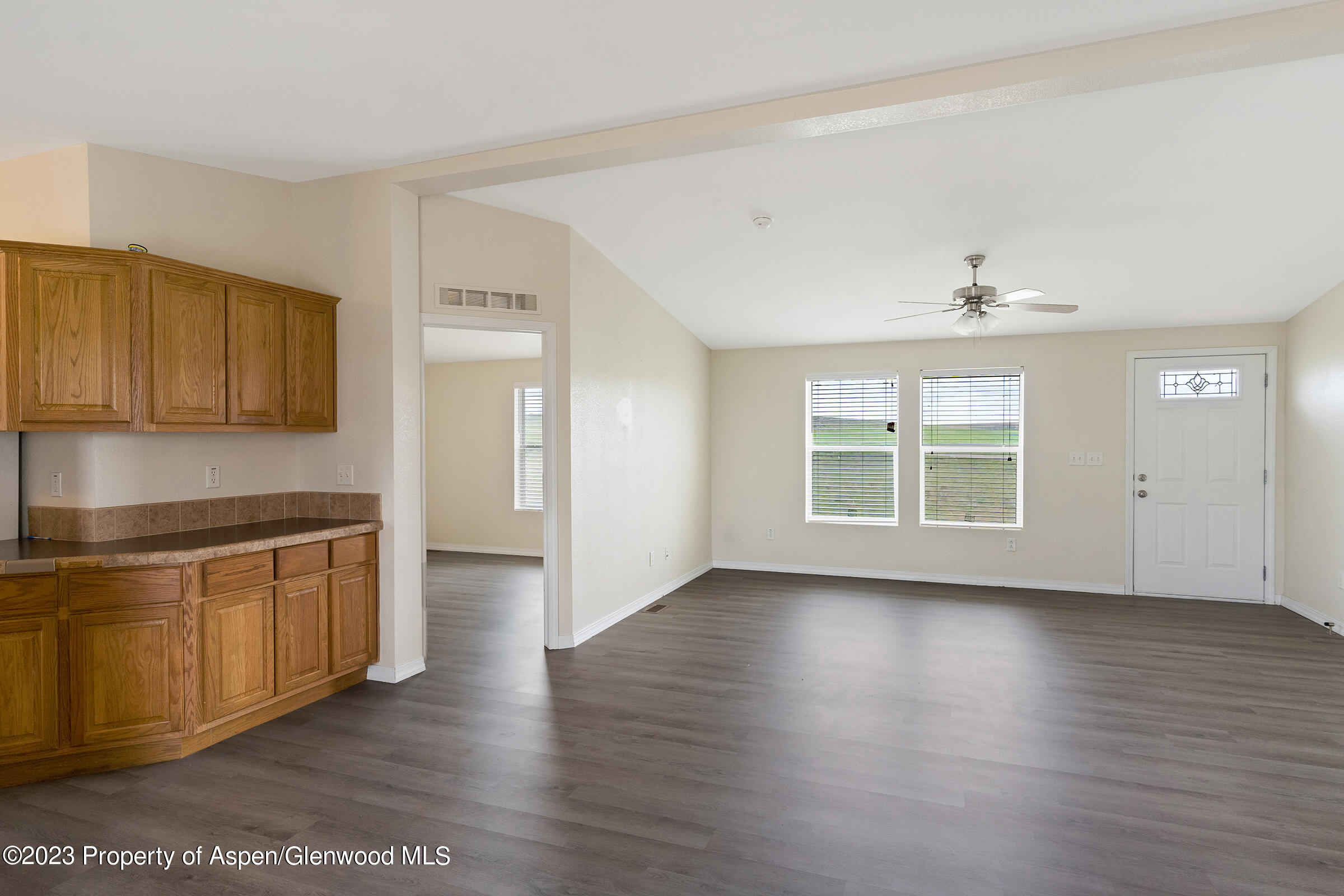378 Sunset Drive Craig, CO 81625 - Photo 9 of 22 a view of a kitchen with wooden floor and a kitchen