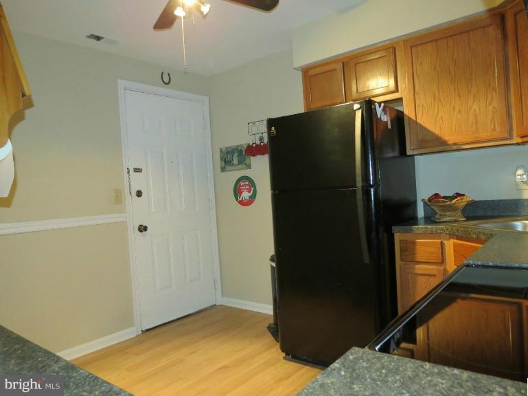 11920 Liberty Road, Unit 206B Frederick, MD 21701 - Photo 2 of 12 Entry Door into Kitchen