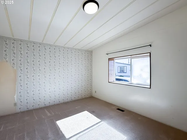 a backyard of a house with lots of green space