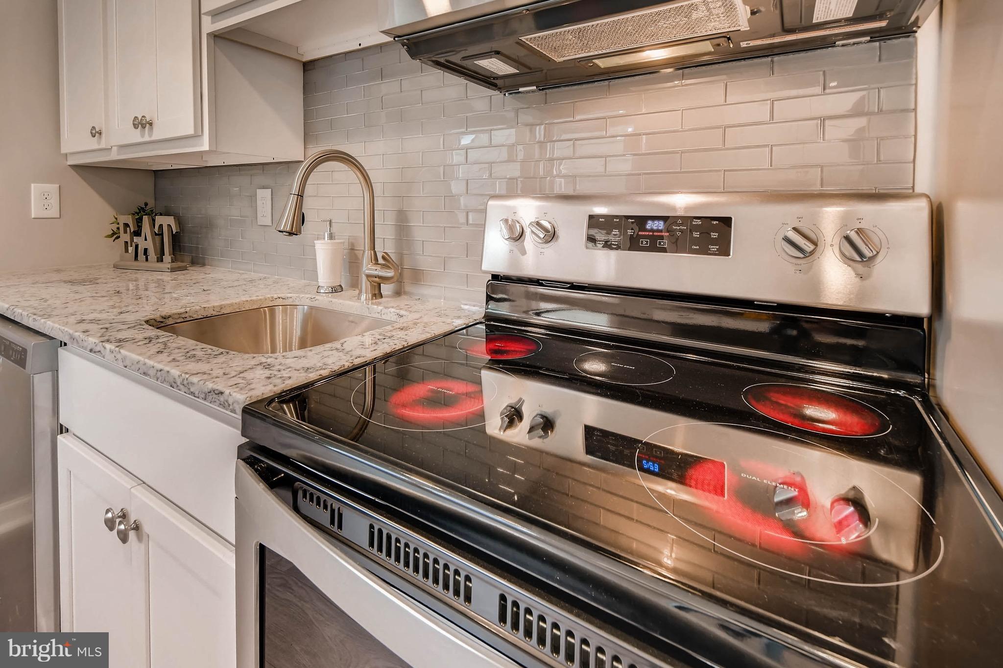 10 Control Court Baltimore, MD 21220 - Photo 14 of 28 a stove top oven sitting inside of a kitchen