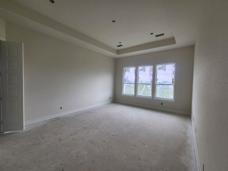 2320 Quartz Street Krum, TX 76249 - Photo 13 of 17 a view of an empty room with a window