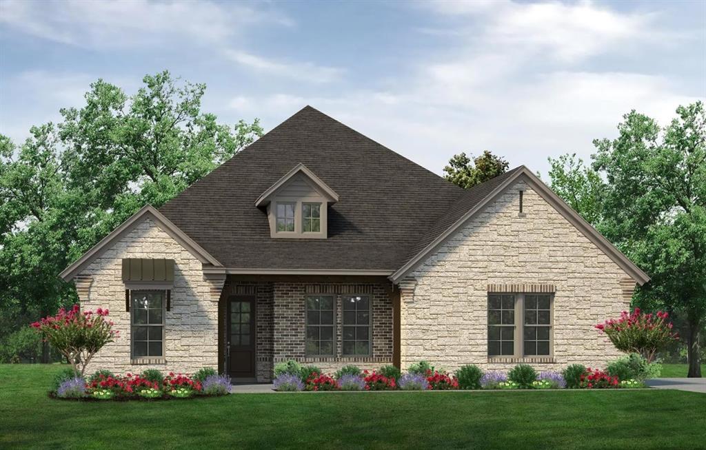 2320 Quartz Street Krum, TX 76249 - Photo 2 of 17 a front view of a house with a garden and yard