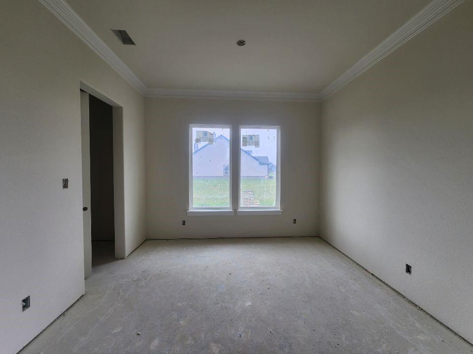 2320 Quartz Street Krum, TX 76249 - Photo 8 of 17 a view of an empty room with a window