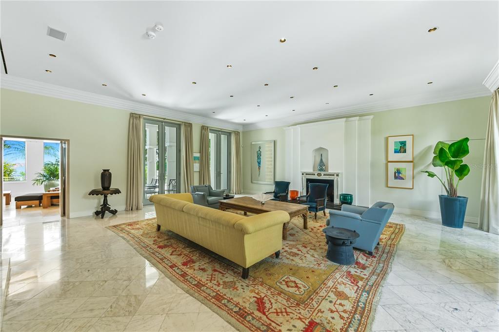 3315 Bay Shore Road Sarasota, FL 34234 - Photo 17 of 96 a living room with furniture and wooden floor
