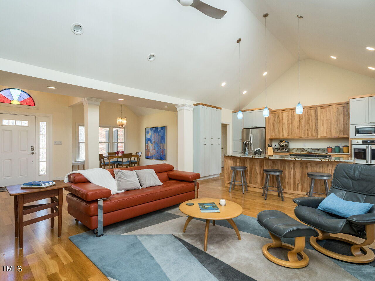 1048 Shadywood Lane Raleigh, NC 27603 - Photo 35 of 35 a living room with furniture kitchen and a table