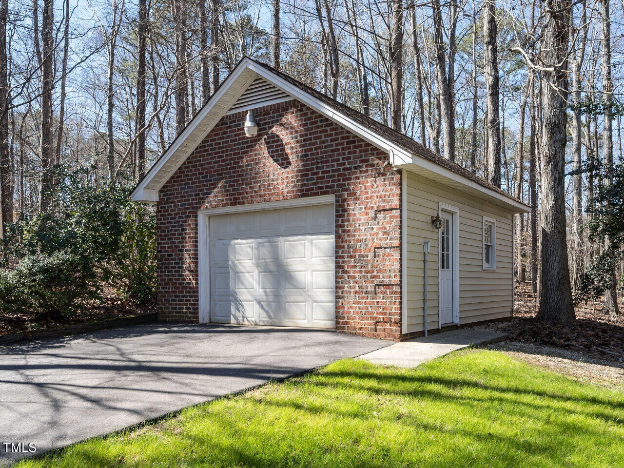 1048 Shadywood Lane Raleigh, NC 27603 - Photo 27 of 35 a front view of a house with a yard