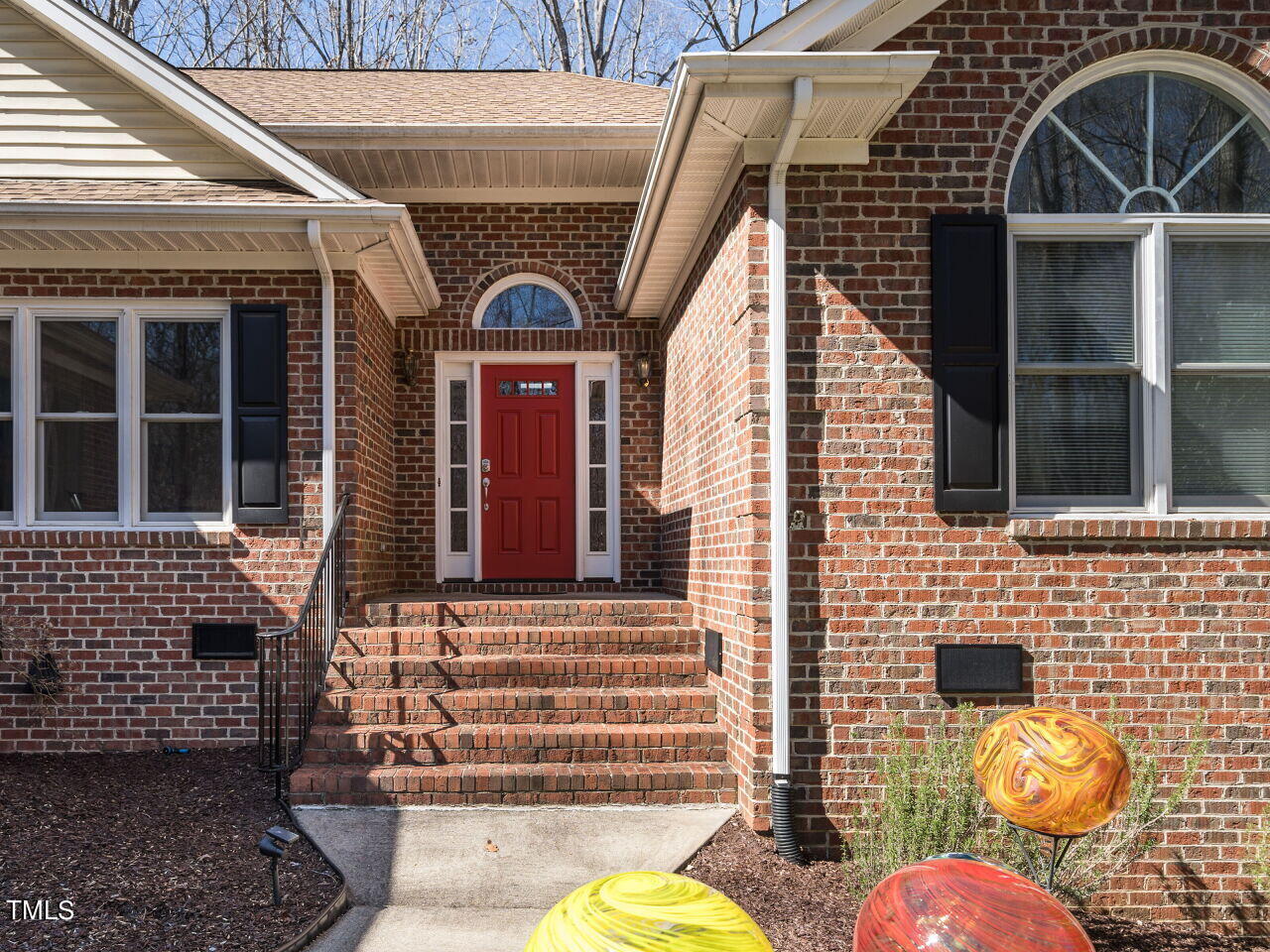 1048 Shadywood Lane Raleigh, NC 27603 - Photo 5 of 35 a front view of a house with outdoor space
