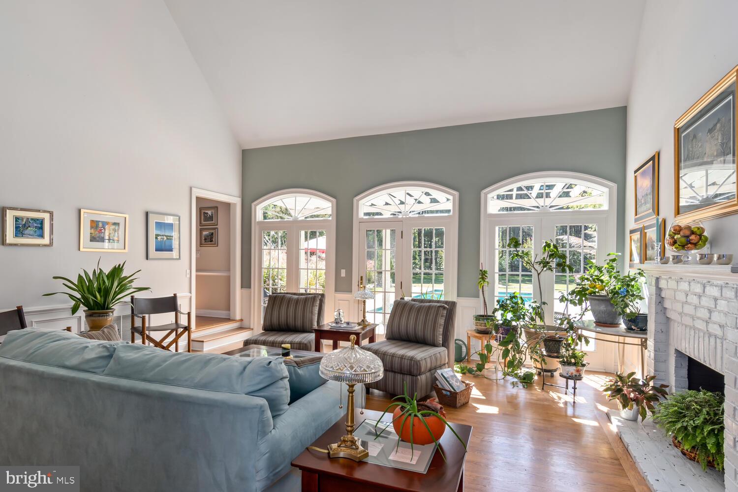 8466 Aveley Farm Road Easton, MD 21601 - Photo 20 of 64 Living room vaulted ceiling, overlooks pool