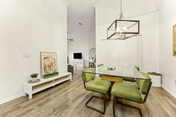 a living room with furniture and a table