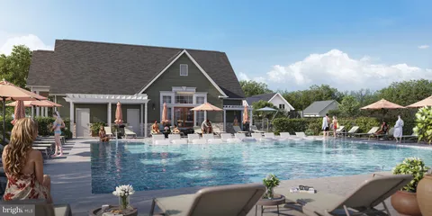 a front view of house with yard and seating area