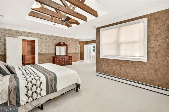 a view of a house with a yard and garage