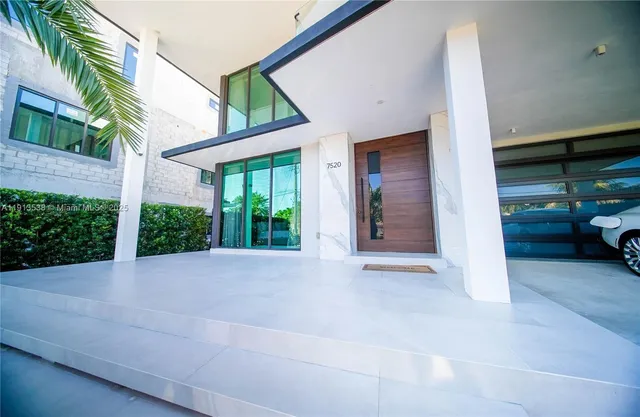 a view of a car park in front of a building