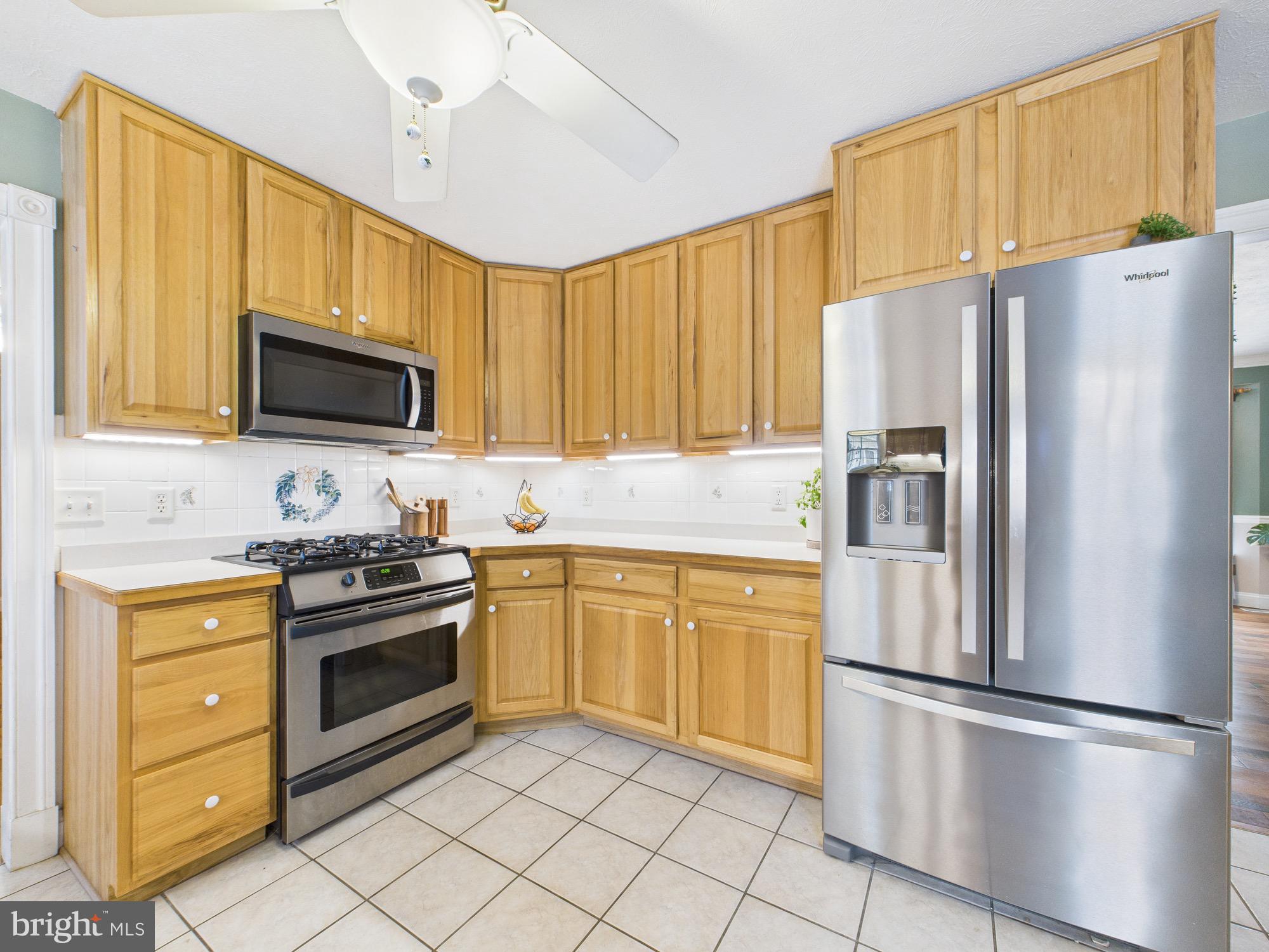 56 Smoot Road Woodstock, VA 22664 - Photo 12 of 52 Modern kitchen with warm wood cabinetry.