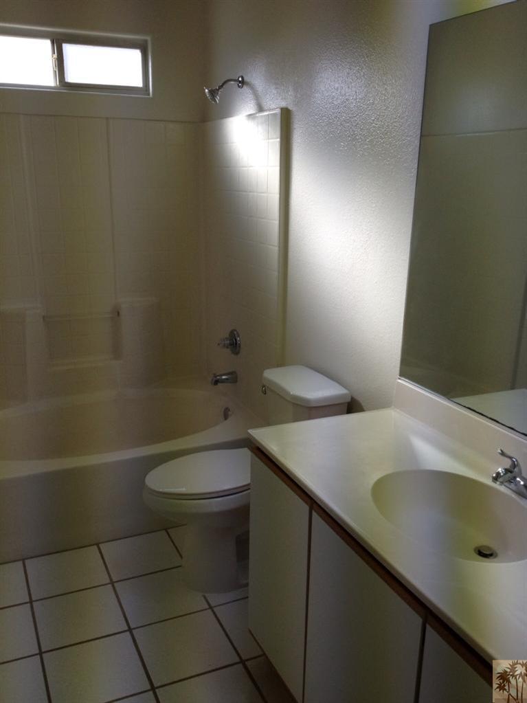 68260 Risueno Road Cathedral City, CA 92234 - Photo 16 of 25 a bathroom with a sink a toilet and shower
