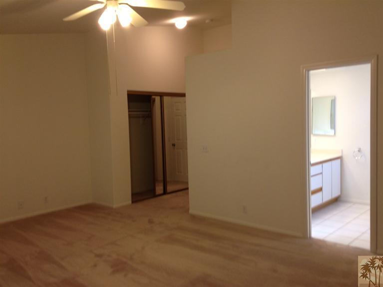 68260 Risueno Road Cathedral City, CA 92234 - Photo 18 of 25 a view of an empty room and wooden floor