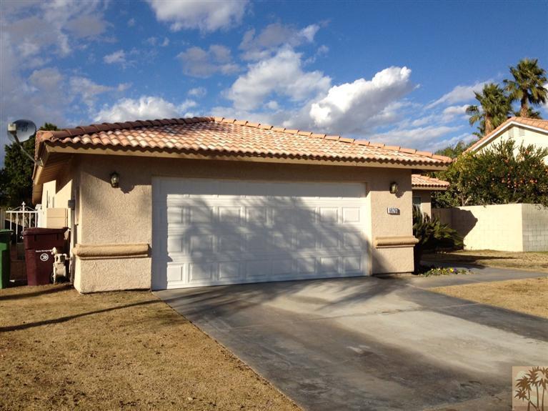 68260 Risueno Road Cathedral City, CA 92234 - Photo 2 of 25 a view of a house with a garage