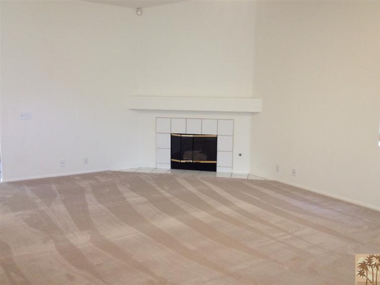 68260 Risueno Road Cathedral City, CA 92234 - Photo 7 of 25 a view of empty room with a fireplace