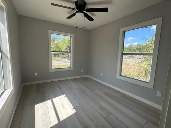 a view of an empty room and window