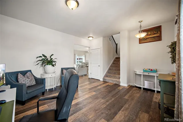 a bathroom with a double vanity sink mirror and toilet
