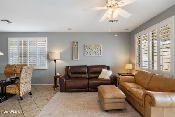 a living room with furniture and a window