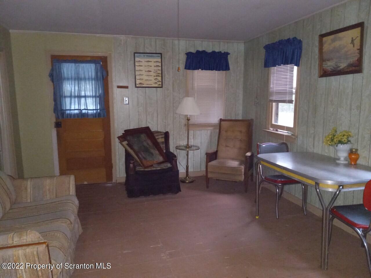 48 1/2 Indian Spring Road Tunkhannock, PA 18657 - Photo 6 of 15 a living room with furniture and a window