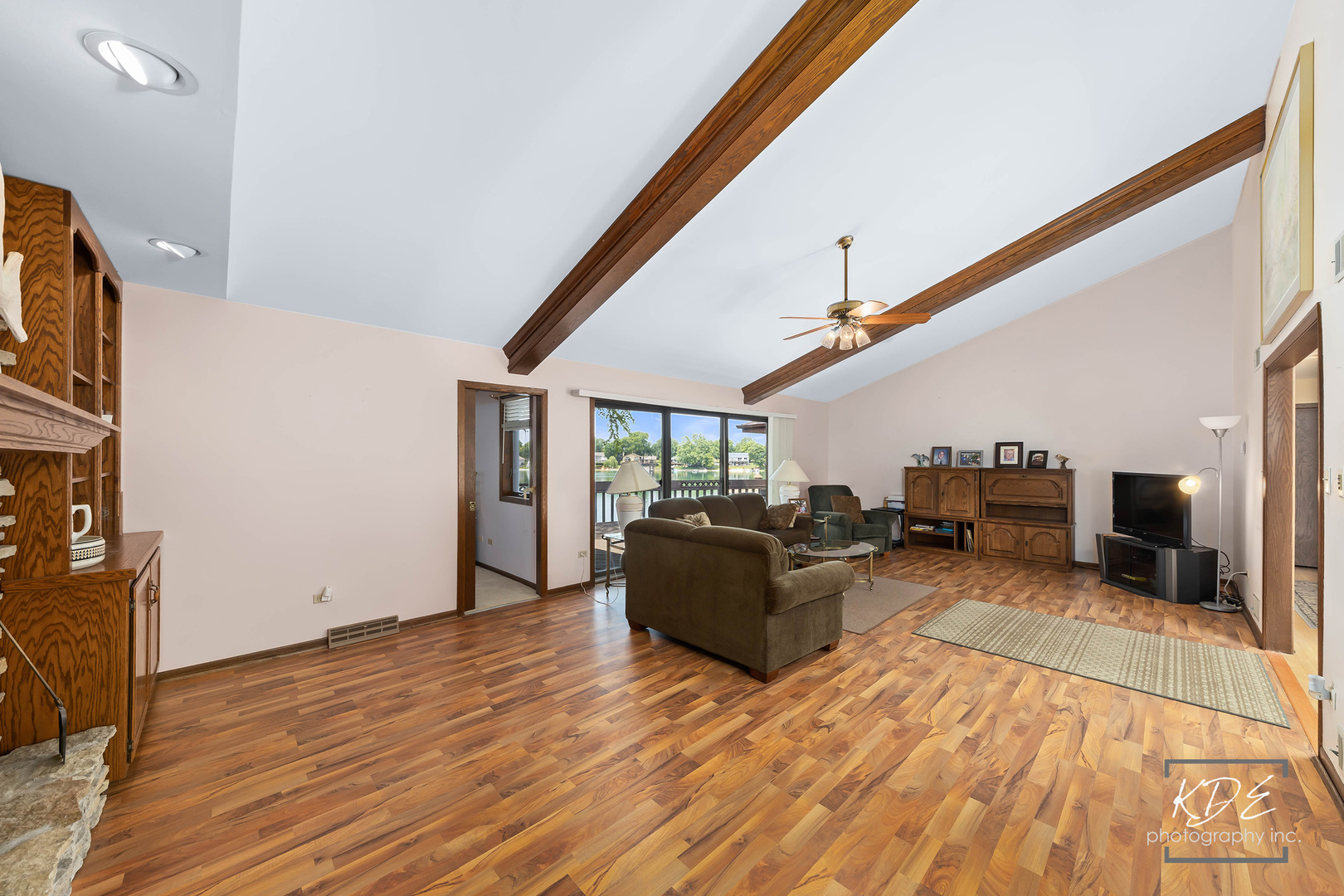 23211 Pilcher Road Plainfield, IL 60544 - Photo 13 of 58 a living room with furniture and a flat screen tv