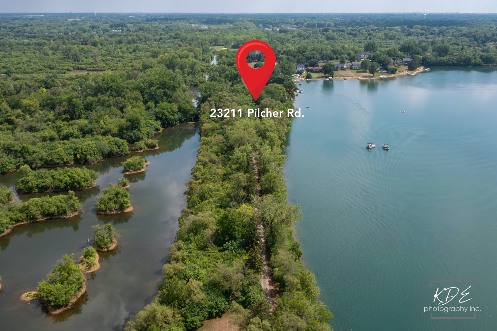 23211 Pilcher Road Plainfield, IL 60544 - Photo 2 of 58 an aerial view of a house with outdoor space and lake view