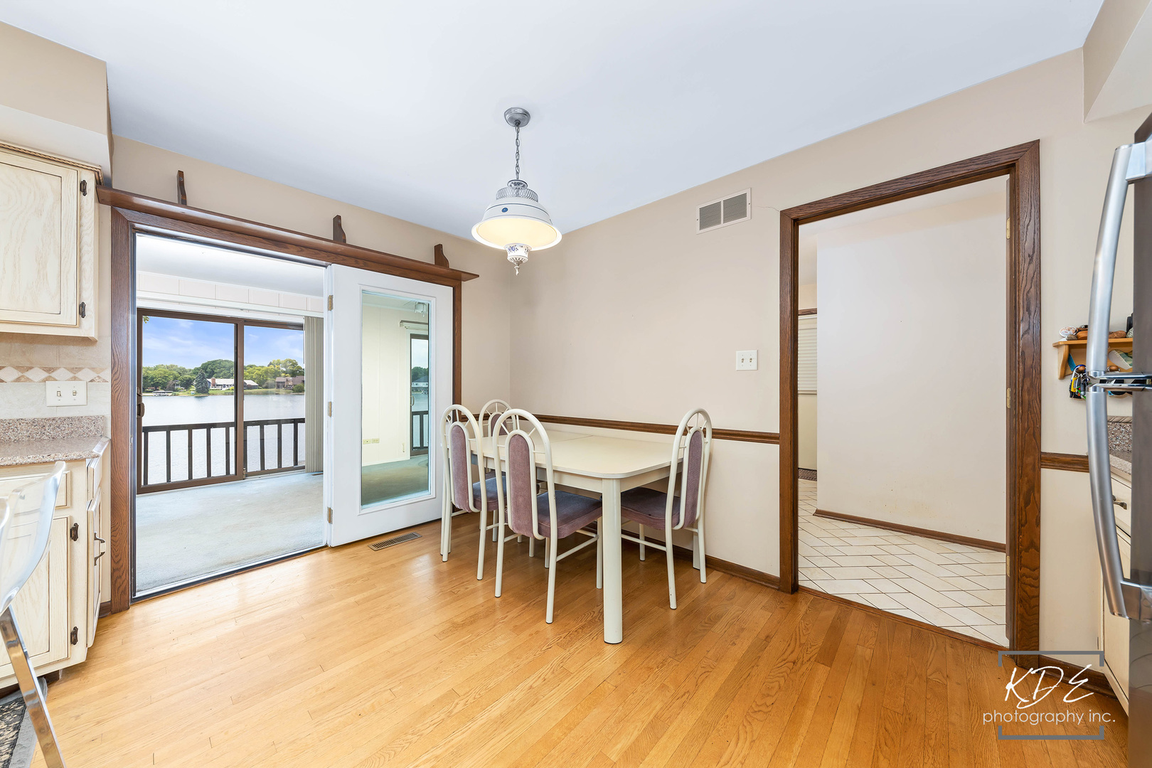 23211 Pilcher Road Plainfield, IL 60544 - Photo 23 of 58 a view of a dining room with furniture window and wooden floor