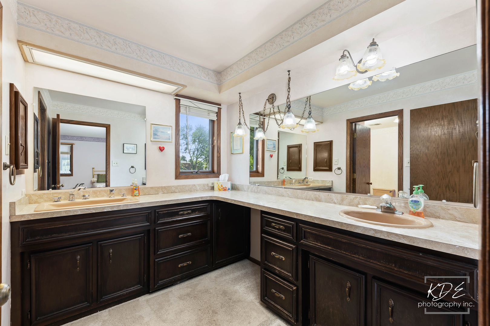 23211 Pilcher Road Plainfield, IL 60544 - Photo 31 of 58 a bathroom with a sink double vanity and a mirror