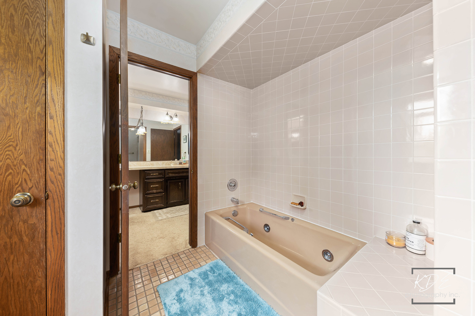 23211 Pilcher Road Plainfield, IL 60544 - Photo 33 of 58 a bathroom with a tub sink and mirror