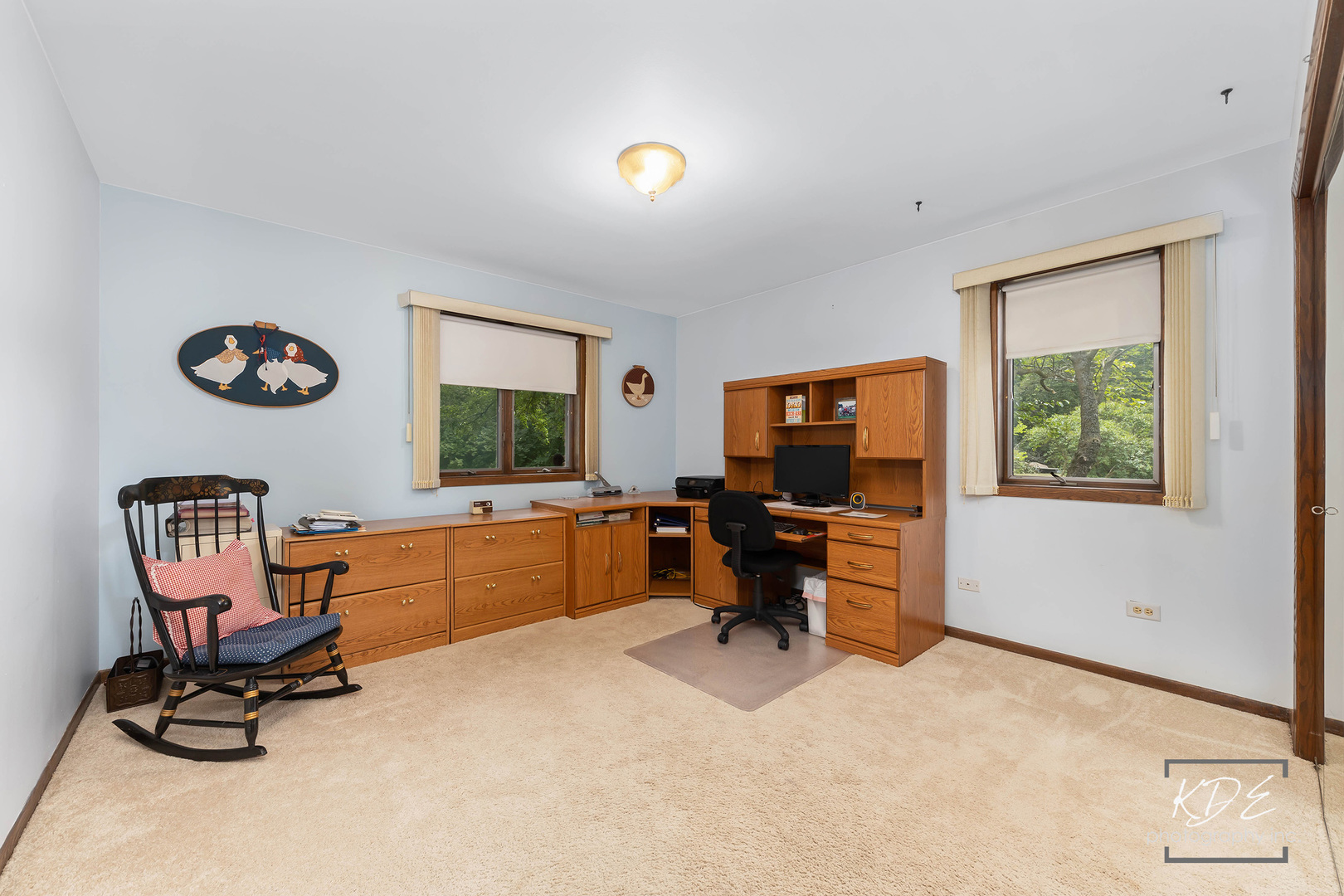 23211 Pilcher Road Plainfield, IL 60544 - Photo 34 of 58 a view of a workspace with furniture and a window
