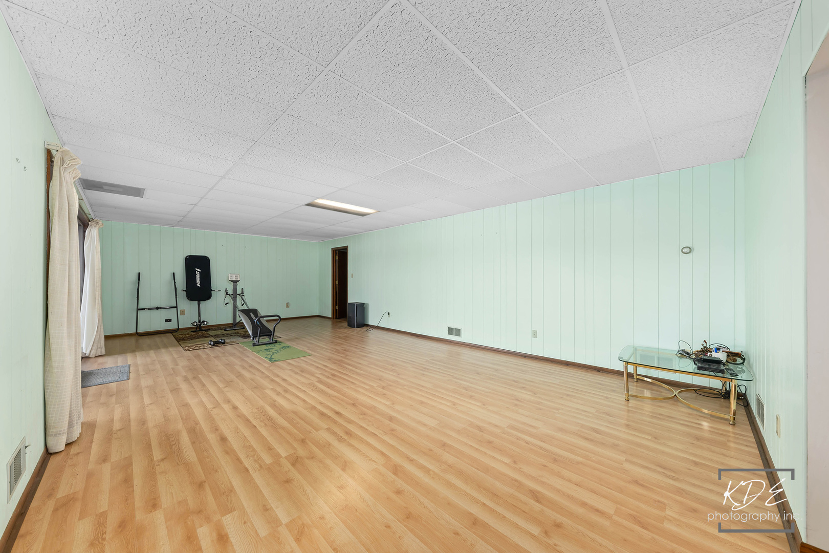 23211 Pilcher Road Plainfield, IL 60544 - Photo 37 of 58 a view of a room with wooden floor and furniture