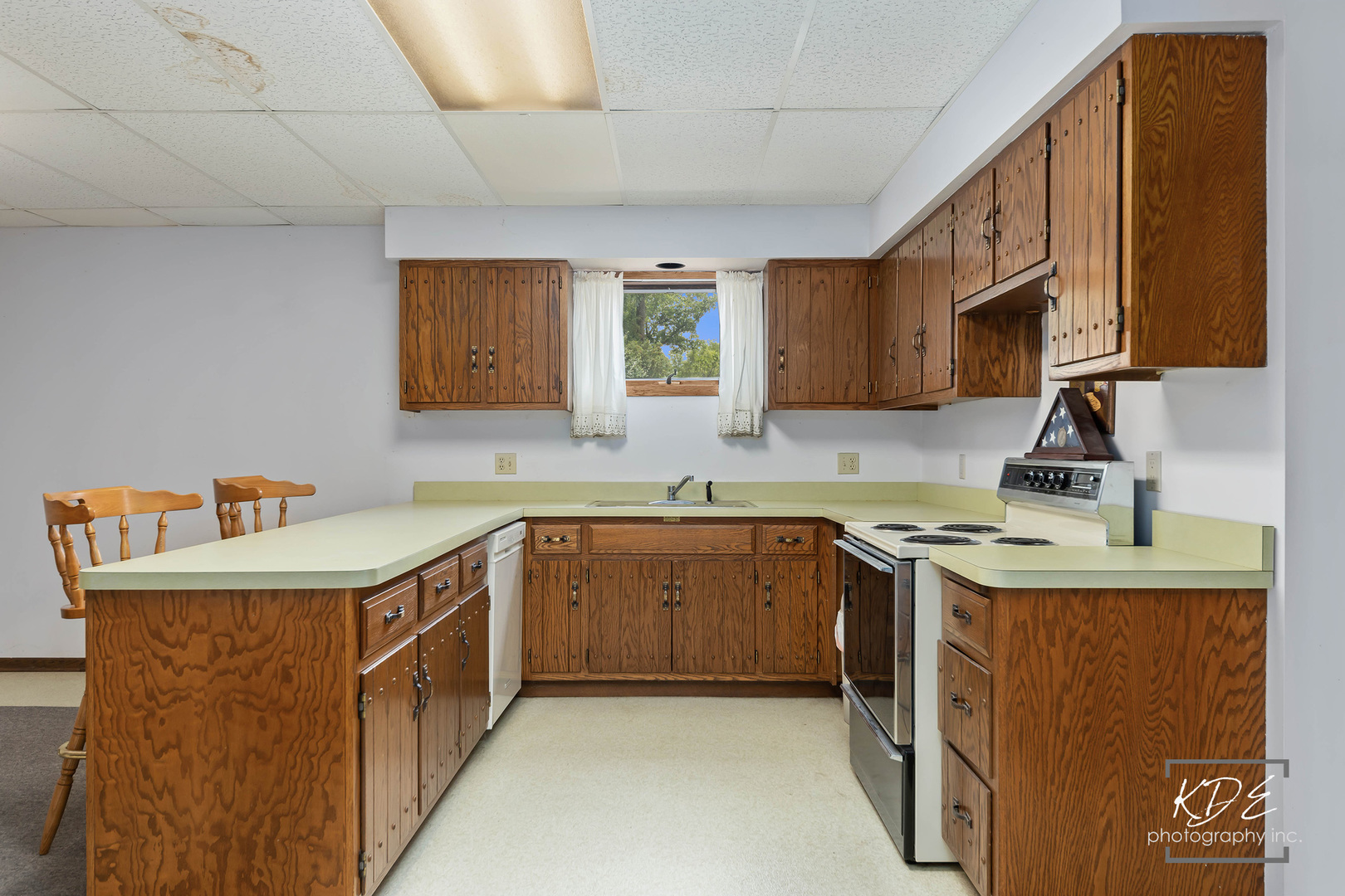 23211 Pilcher Road Plainfield, IL 60544 - Photo 41 of 58 a kitchen with a sink stove and cabinets