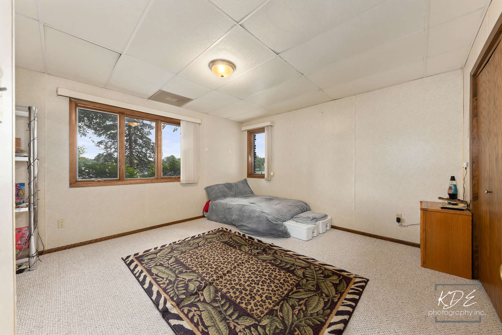 23211 Pilcher Road Plainfield, IL 60544 - Photo 44 of 58 a living room with a couch and a rug