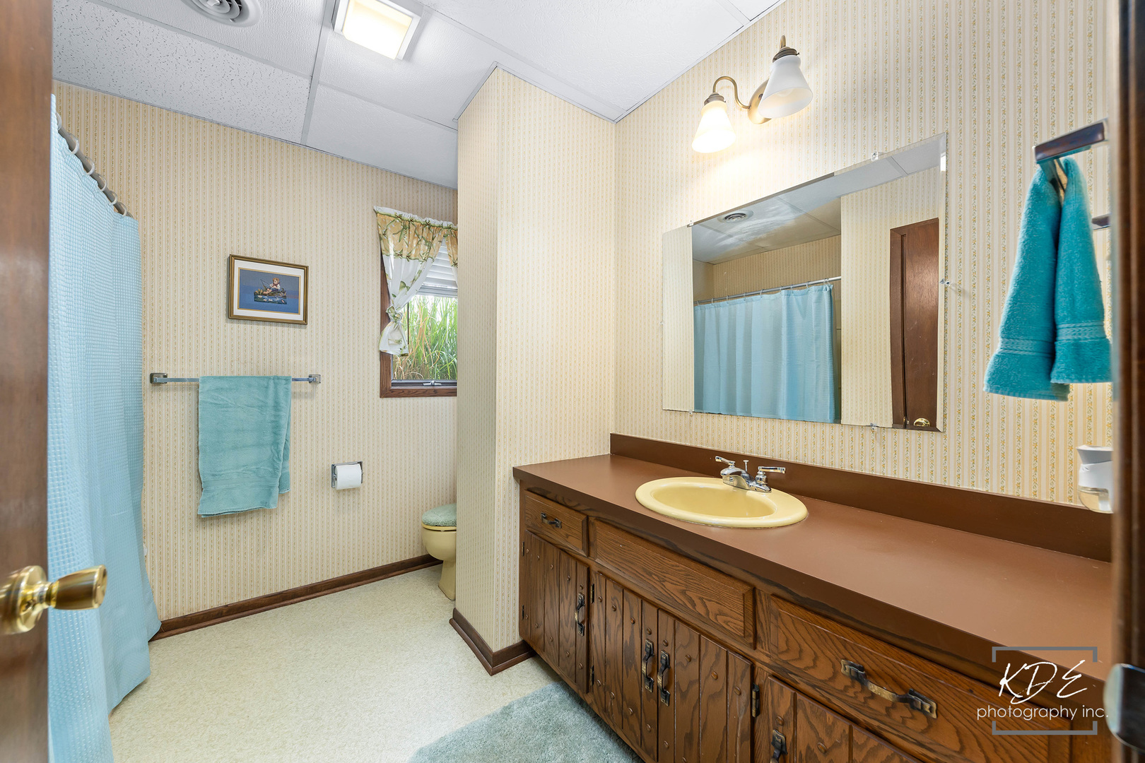 23211 Pilcher Road Plainfield, IL 60544 - Photo 46 of 58 a bathroom with a granite countertop sink and a mirror