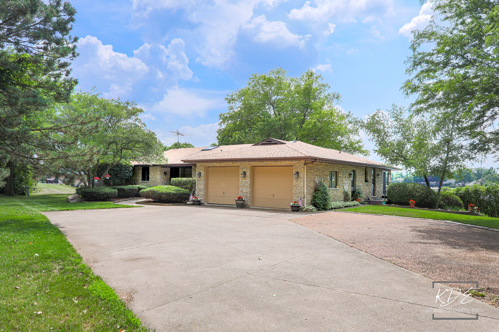 23211 Pilcher Road Plainfield, IL 60544 - Photo 48 of 58 a front view of a house with a yard and trees