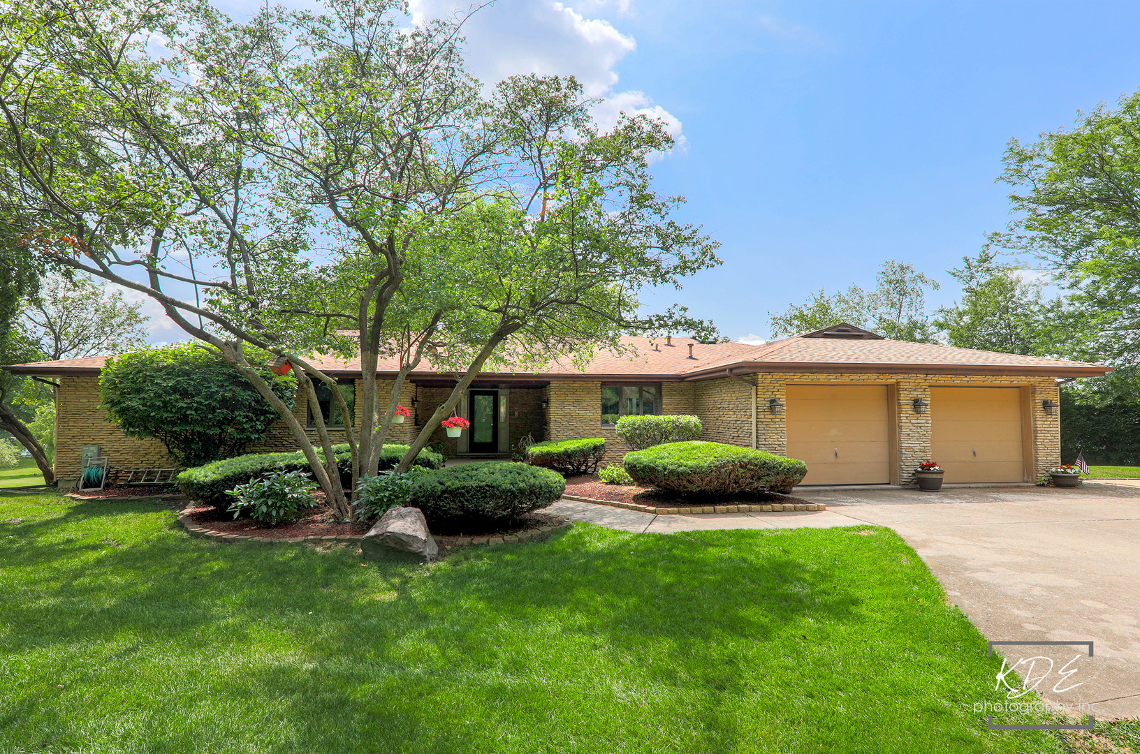 23211 Pilcher Road Plainfield, IL 60544 - Photo 49 of 58 a view of a house with backyard sitting area and garden