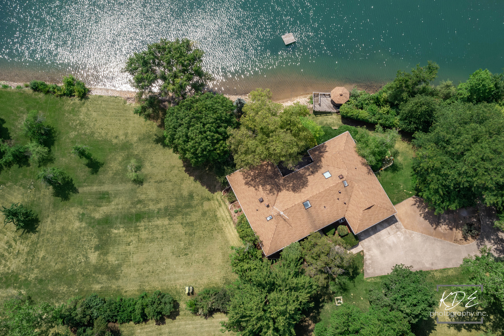 23211 Pilcher Road Plainfield, IL 60544 - Photo 56 of 58 an aerial view of a house with a yard and lake view
