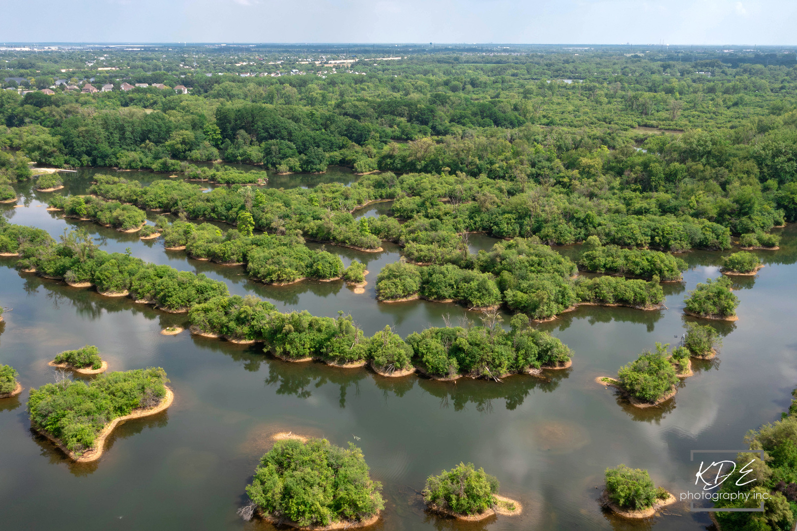 23211 Pilcher Road Plainfield, IL 60544 - Photo 58 of 58 an aerial view of a house with a yard and lake view