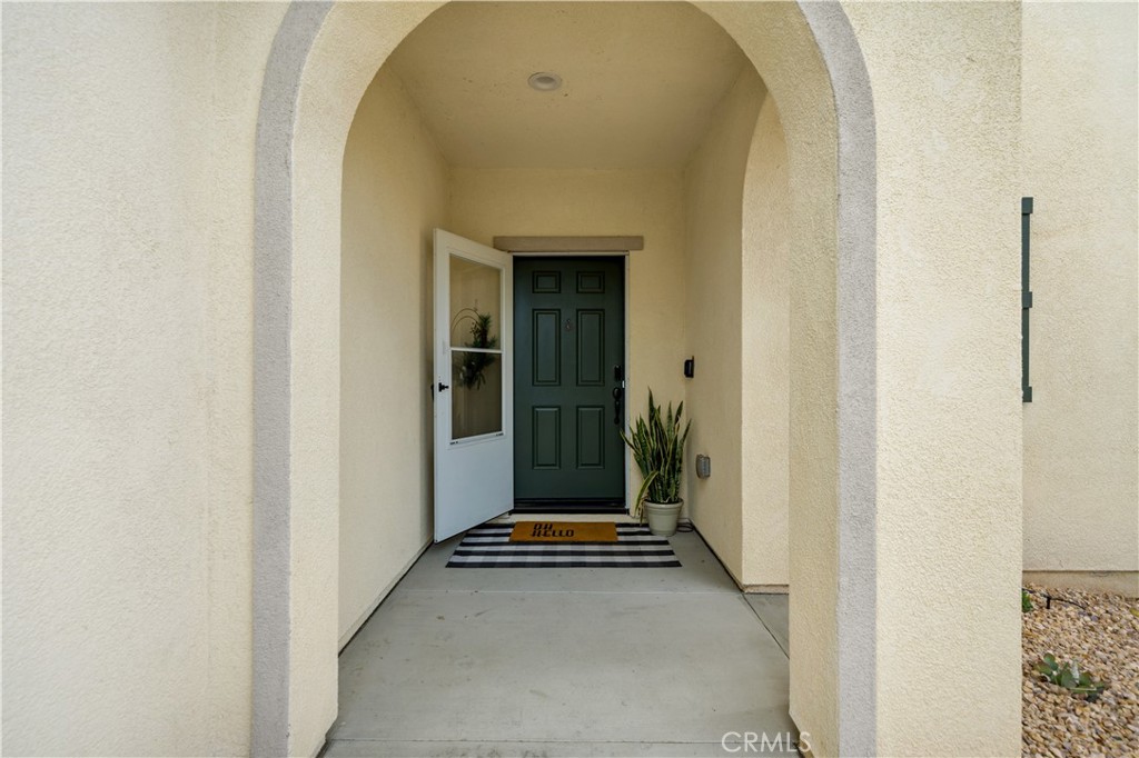 30271 Ramsay Drive Menifee, CA 92584 - Photo 2 of 34 a view of a hallway with wooden floor