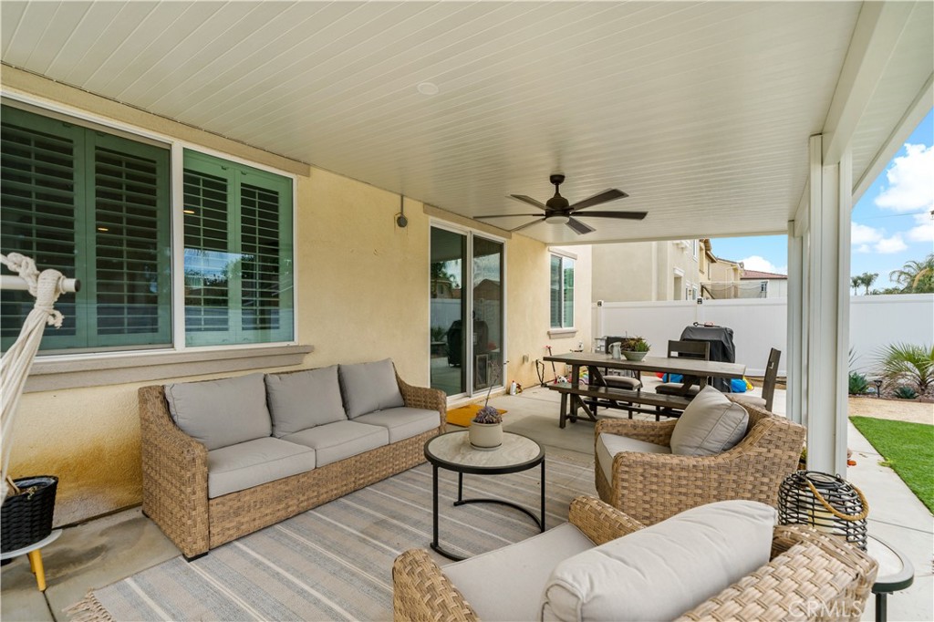 30271 Ramsay Drive Menifee, CA 92584 - Photo 24 of 34 a living room with furniture and a large window