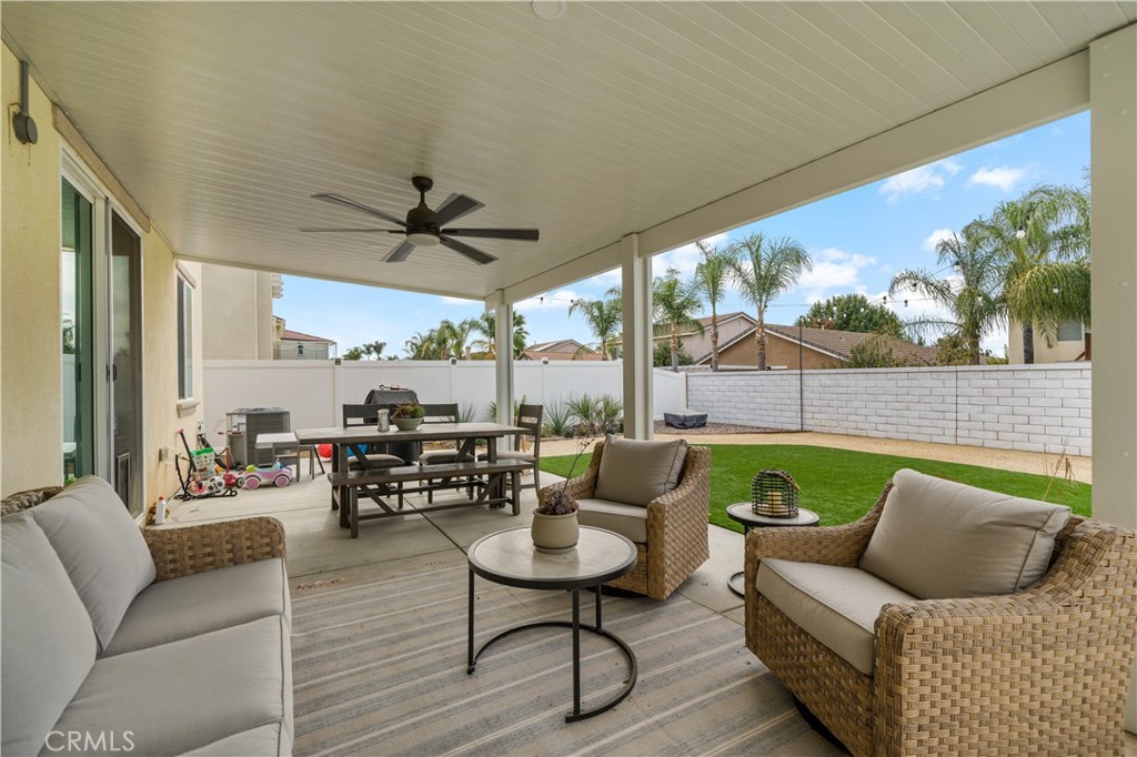 30271 Ramsay Drive Menifee, CA 92584 - Photo 25 of 34 a living room with furniture and a large window