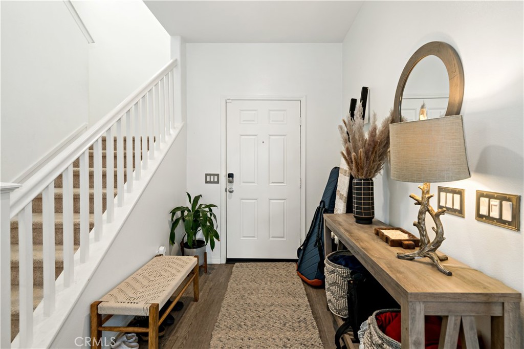 30271 Ramsay Drive Menifee, CA 92584 - Photo 3 of 34 a view of an entryway with wooden floor